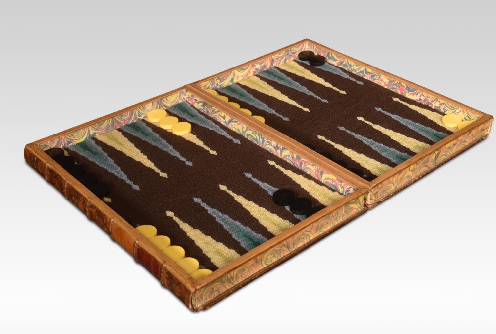 Decorative tooled leather book form folding backgammon set
