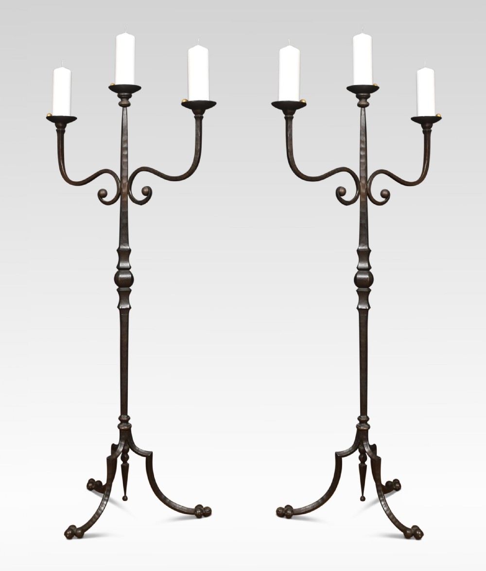 Pair of wrought iron candle stands