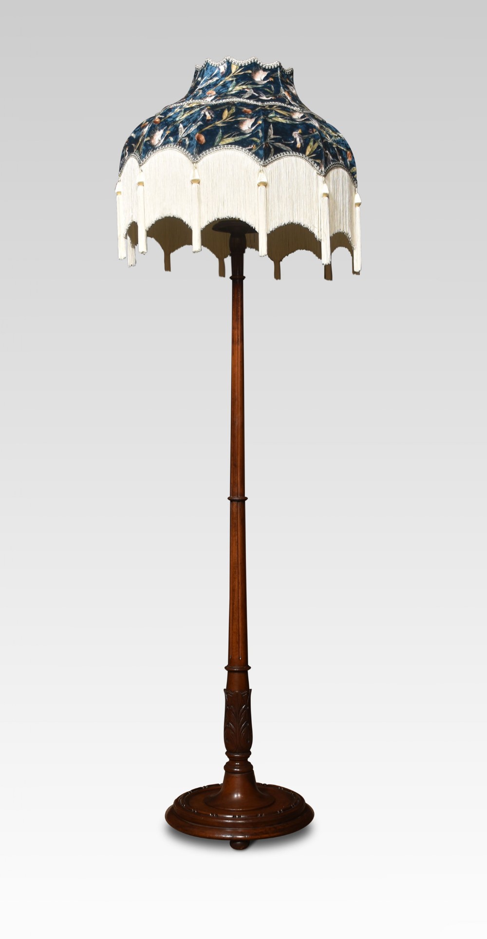 Carved mahogany standard lamp