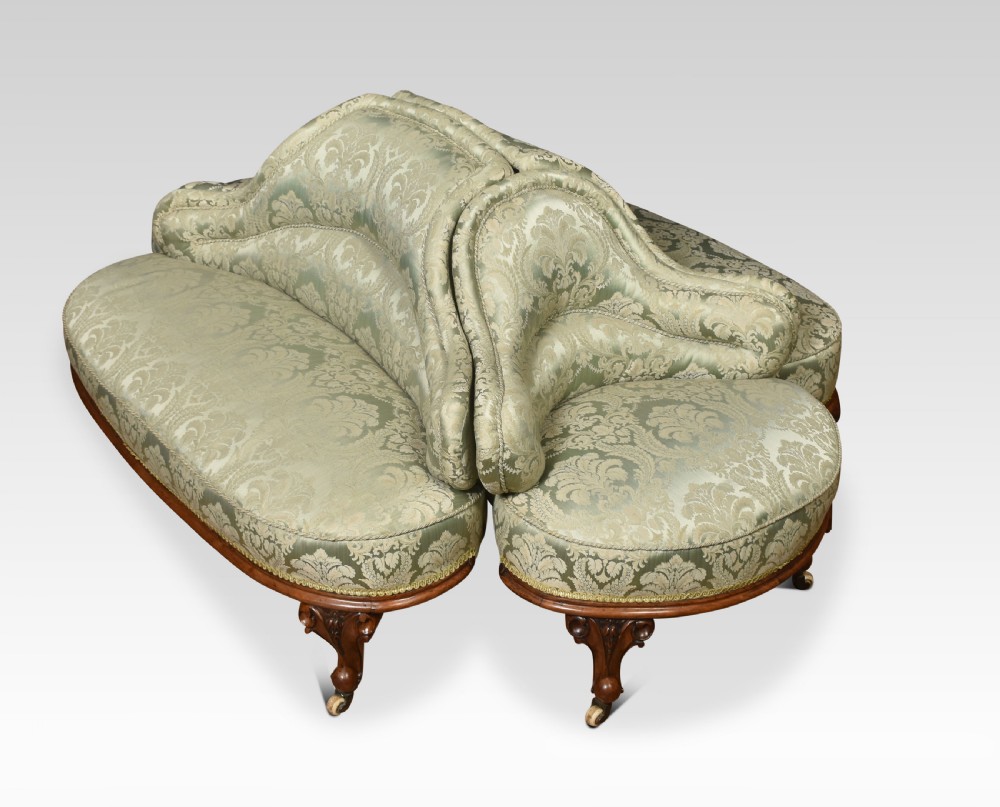 Walnut framed and upholstered conversation seat