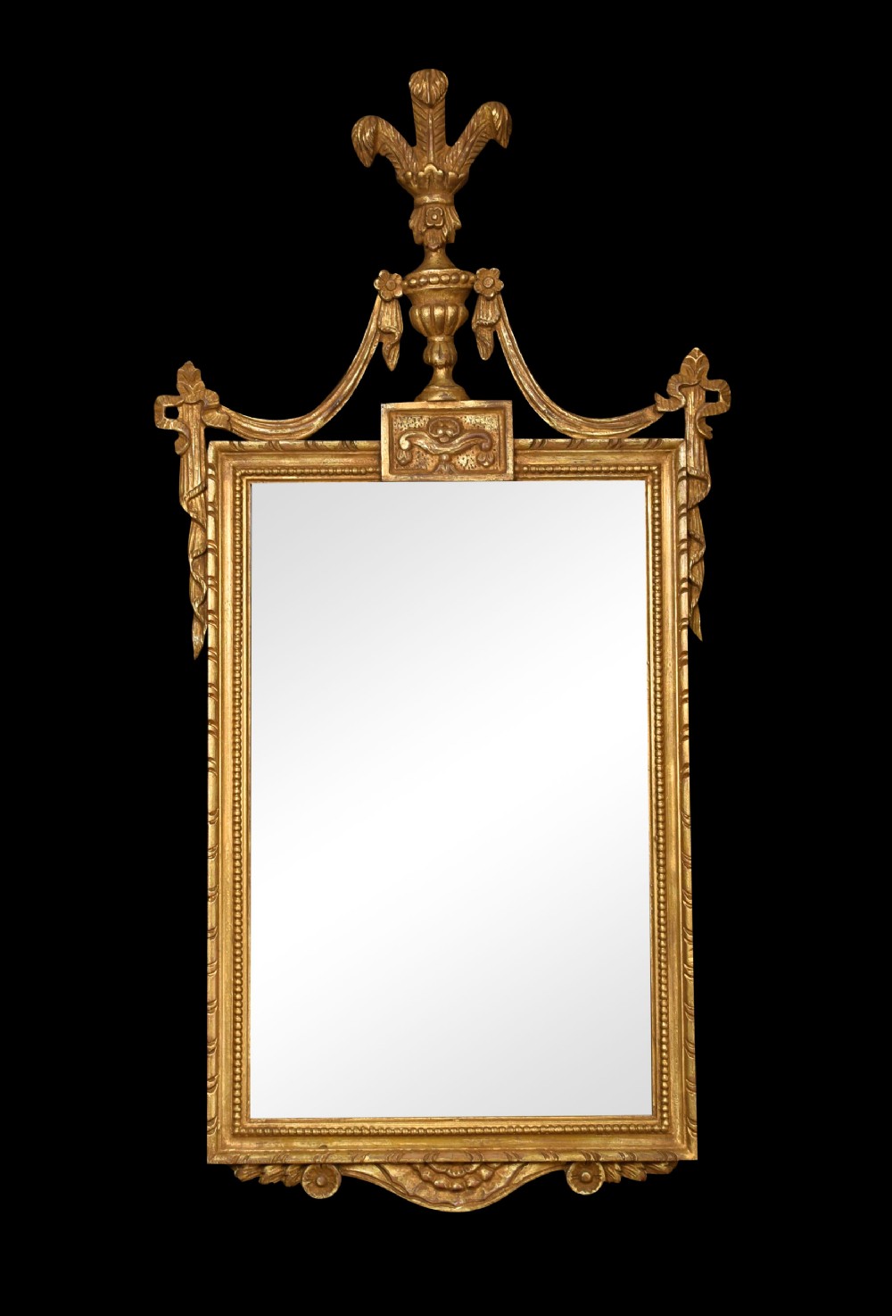 Carved giltwood wall mirror