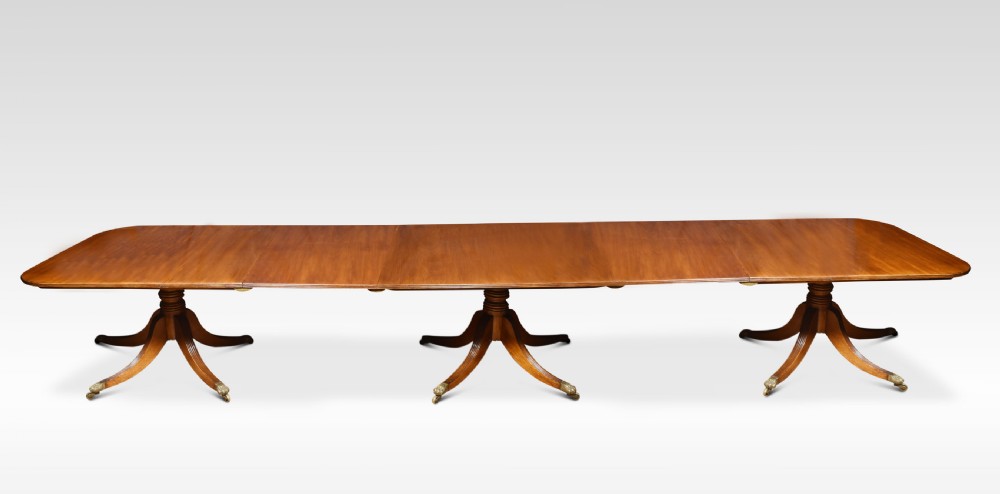 Regency mahogany triple pillar dining table View II