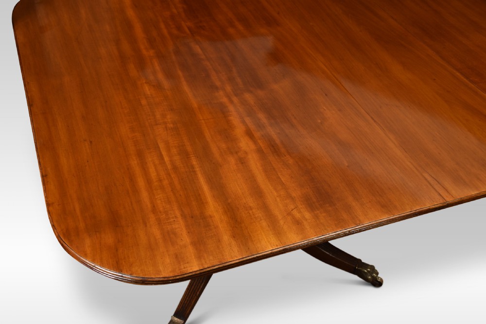 Regency mahogany triple pillar dining table View IV