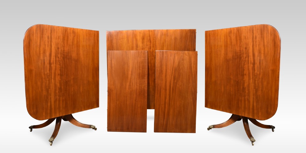 Regency mahogany triple pillar dining table View IX