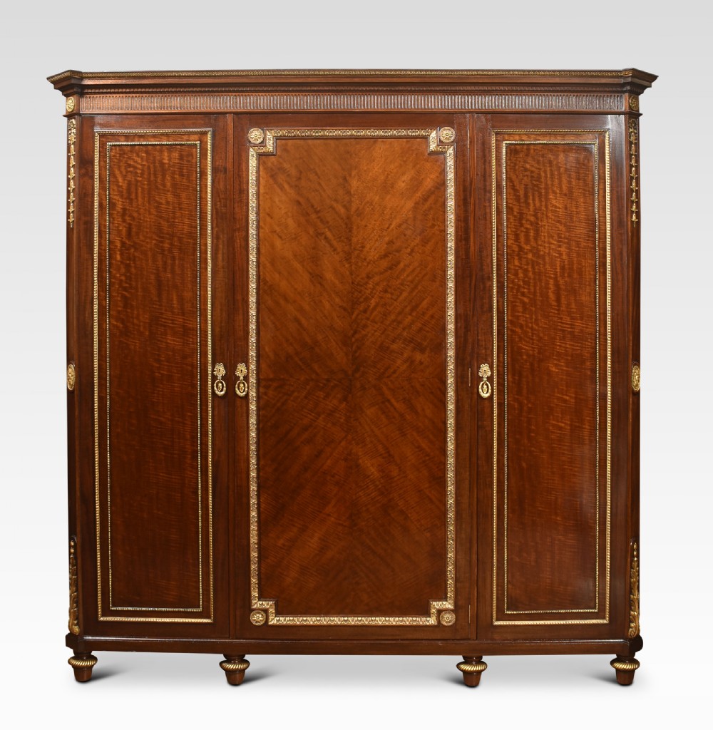 Mahogany three-door compactum wardrobe