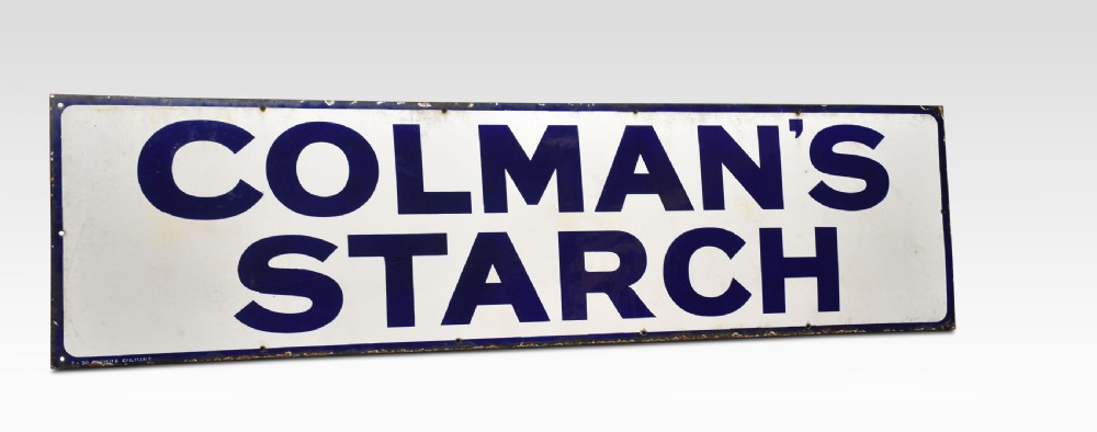 A rectangular antique vitreous enamel sign featuring dark blue block lettering reading COLMANS STARCH on a white background with a dark blue border. View V