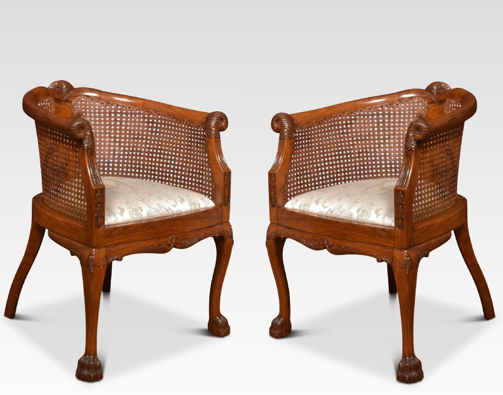 Pair of Walnut bergere arm chairs