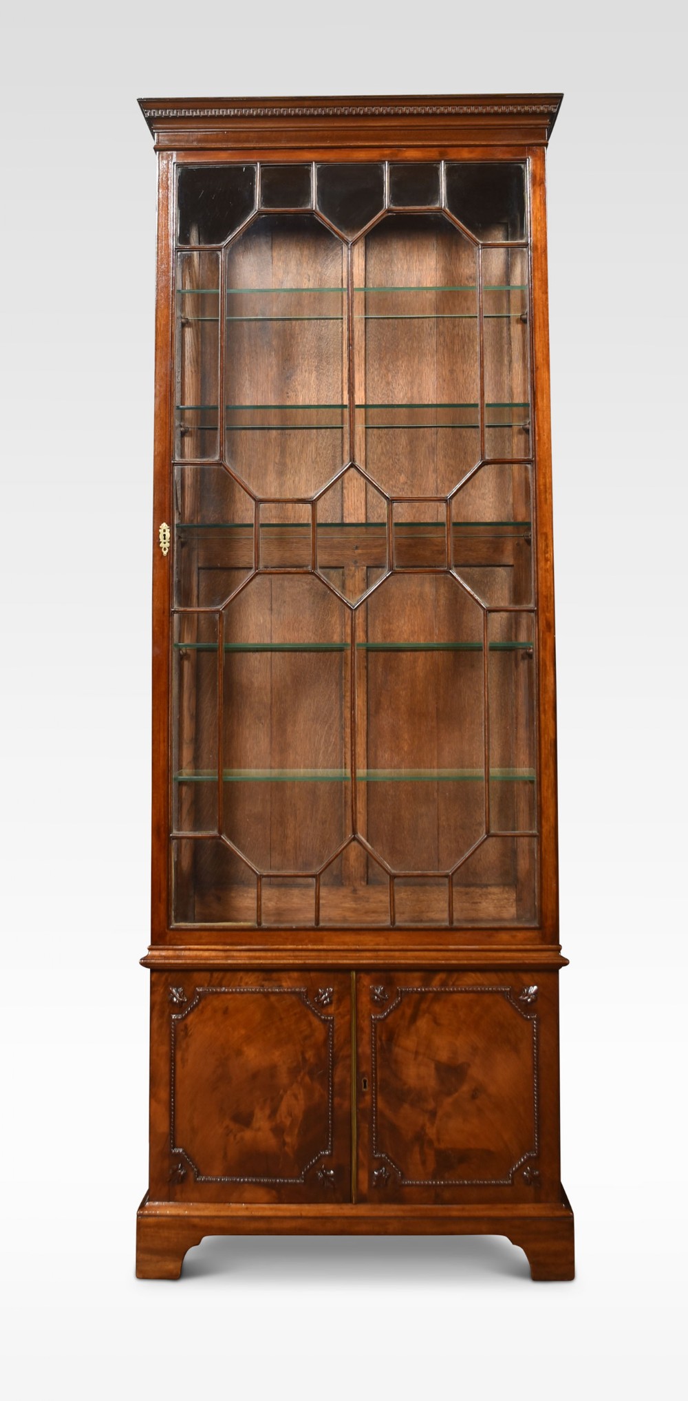 Narrow Regency style mahogany glazed display cabinet