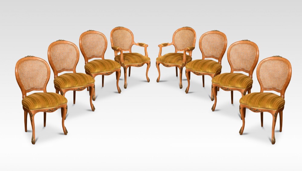 Set of eight cane dining chairs