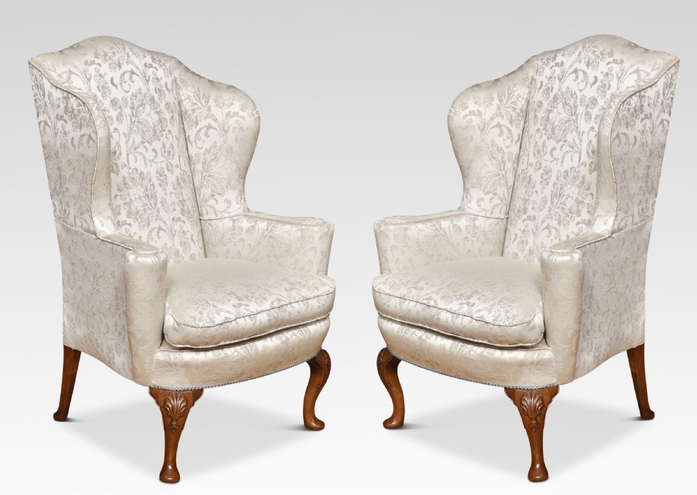 Pair of Georgian style wingback armchairs