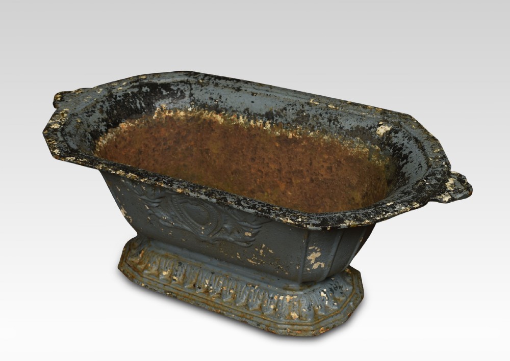 A pair of 19th-century slate grey cast iron trough planters with neoclassical relief decoration and a weathered paint finish. View III