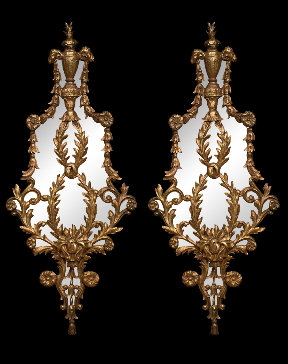 Pair of carved and gilded mirrors