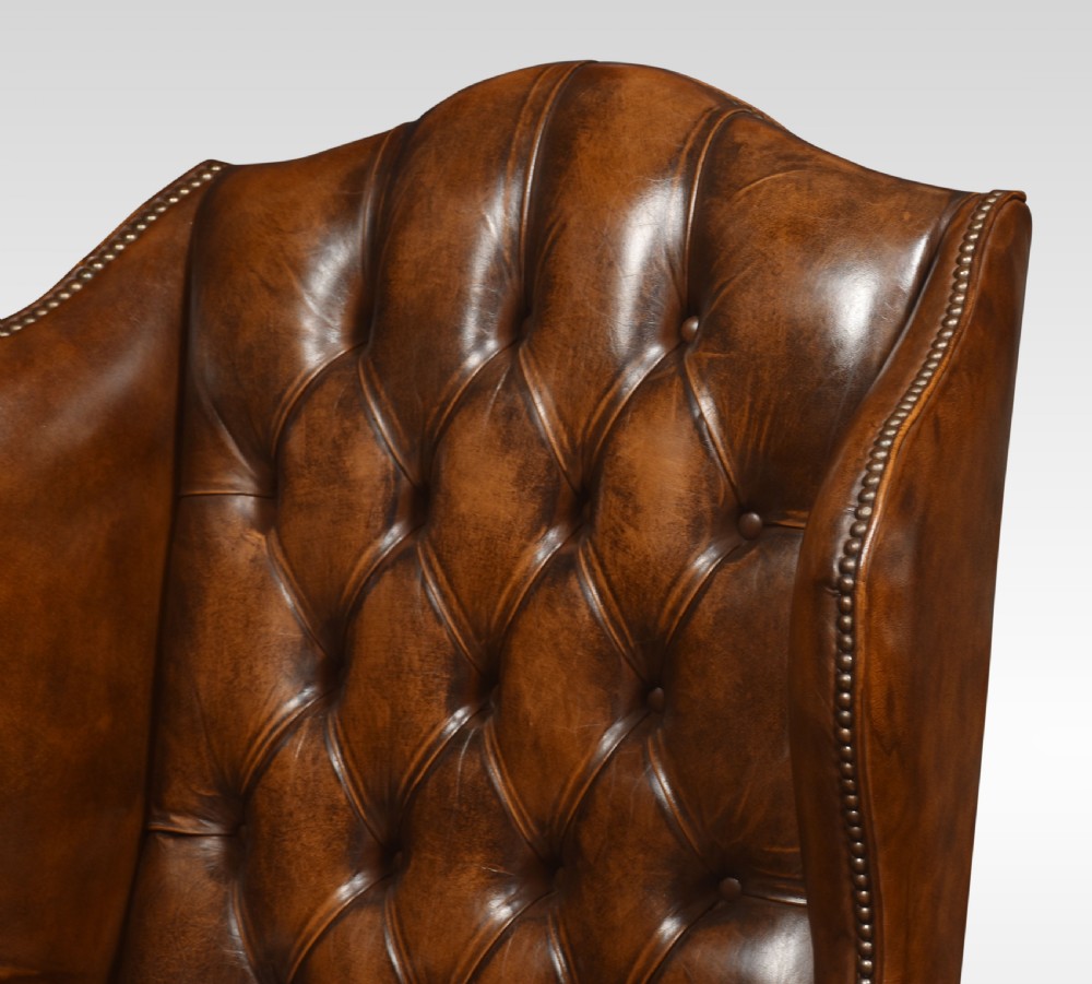 Pair of Leather upholstered wingback armchairs View VII