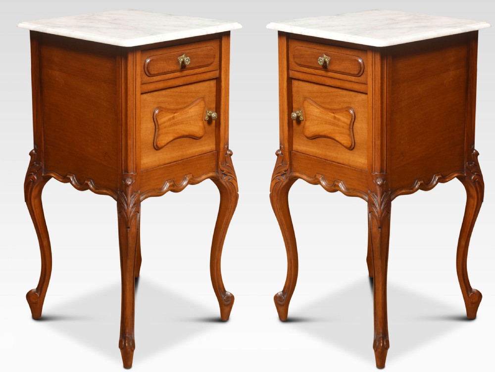 Pair of walnut marble top bedside cabinets