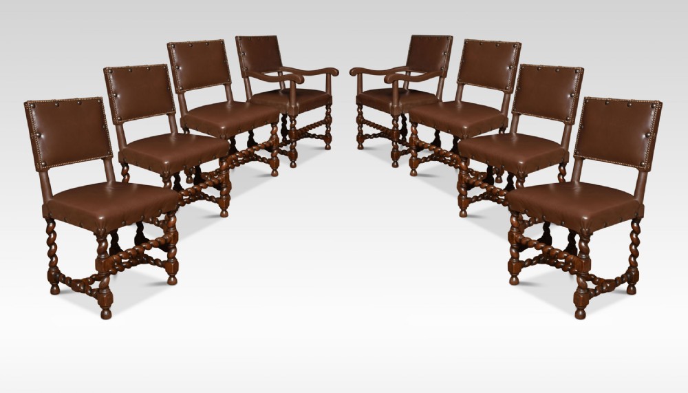 Eight Leather Upholstered Oak Dining Chairs