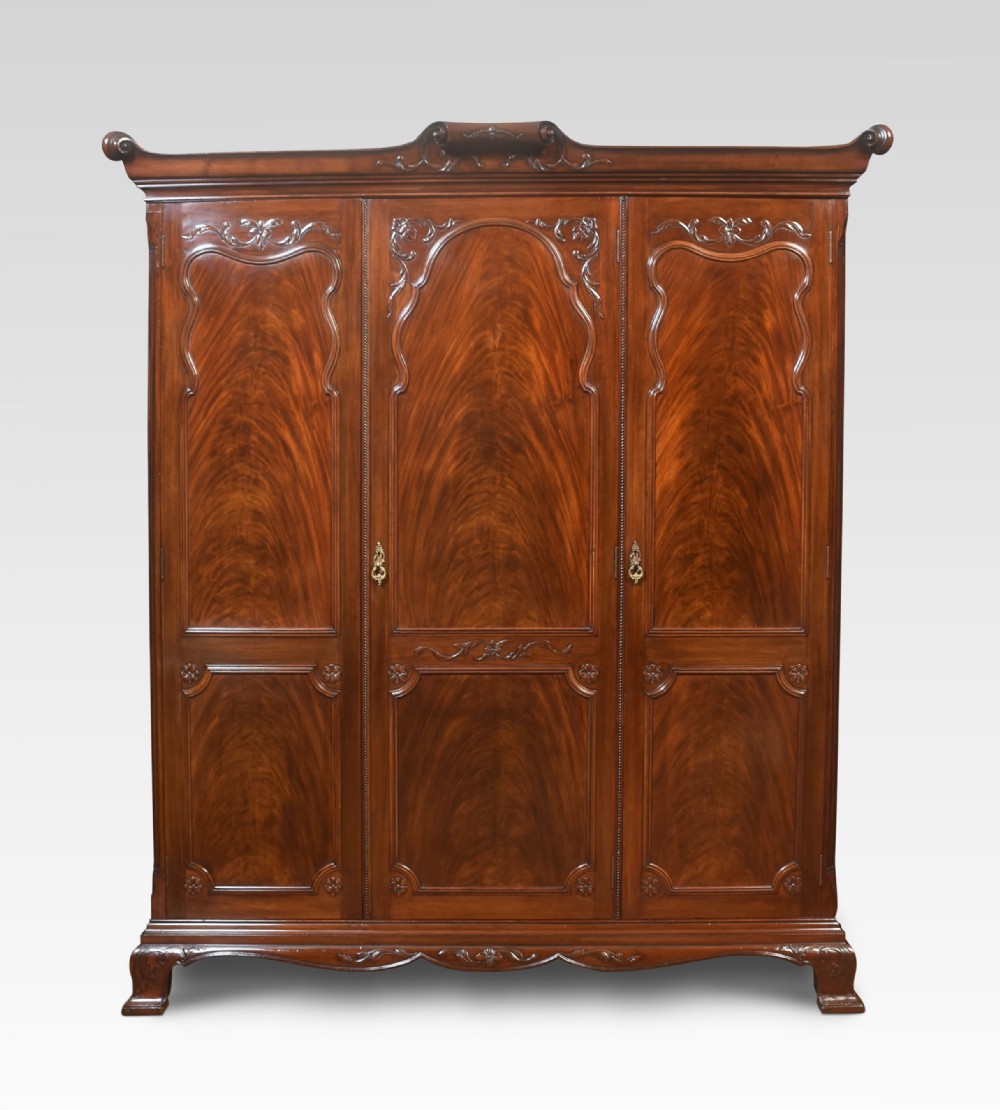 Mahogany three door wardrobe
