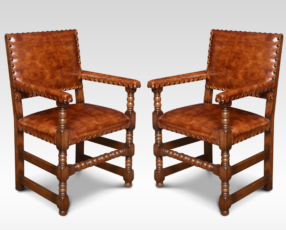 Set of ten substantial oak dining chairs View II