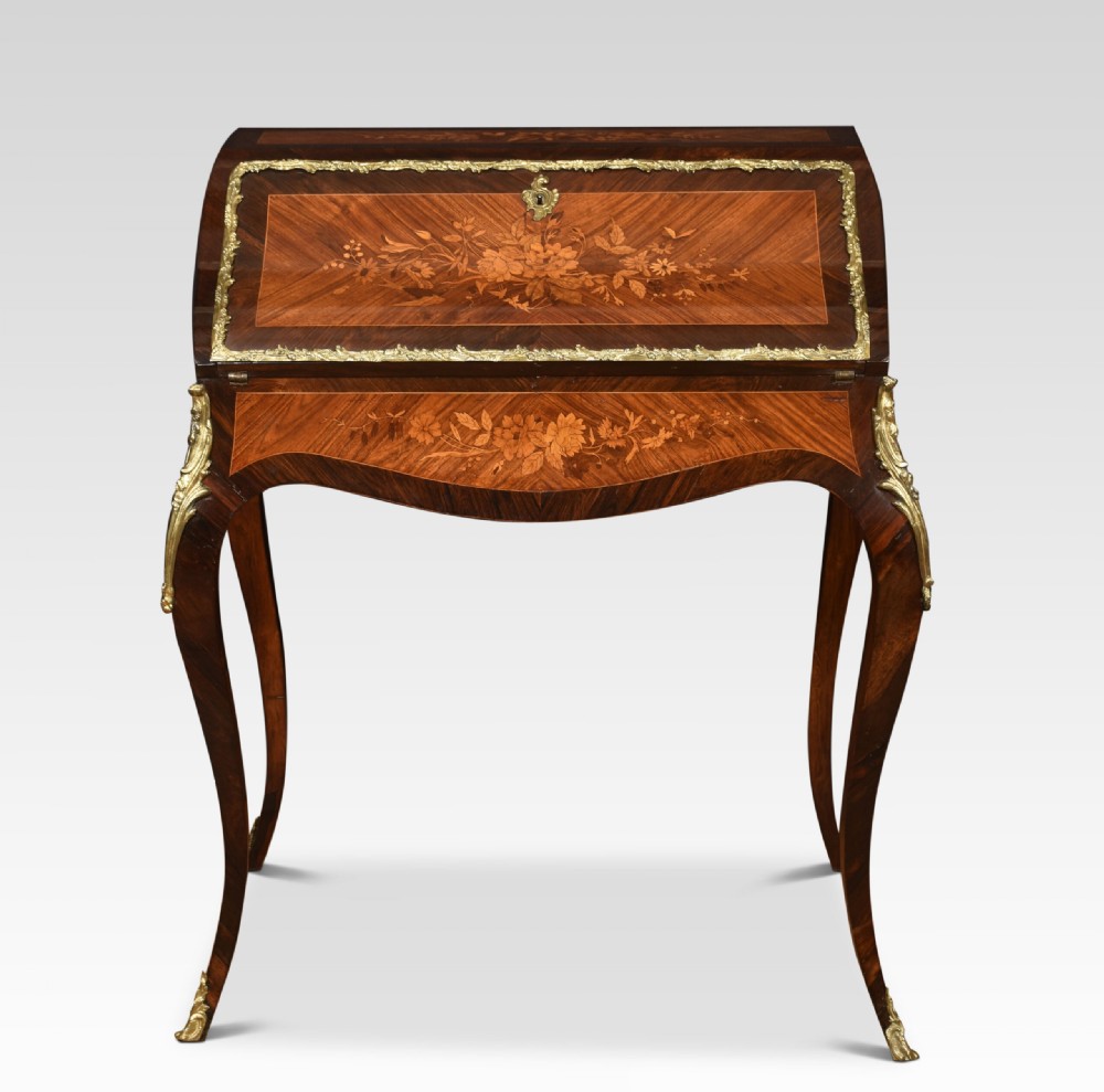An antique French rosewood bureau de dame featuring floral marquetry inlays, gilt-bronze mounts, a sloped writing fall, and slender cabriole legs. View V