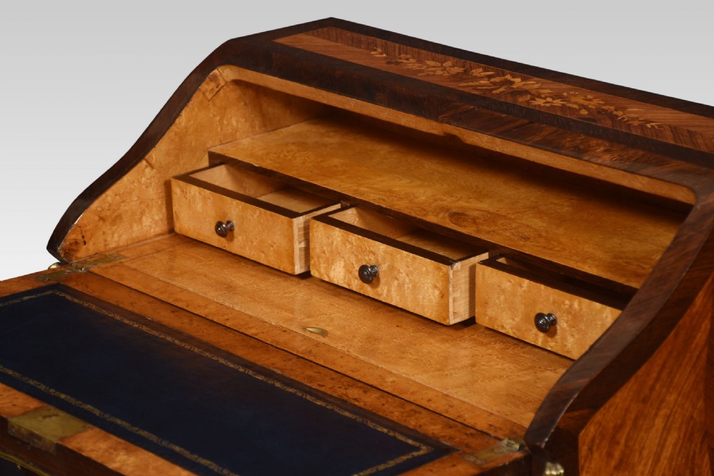 An antique French rosewood bureau de dame featuring floral marquetry inlays, gilt-bronze mounts, a sloped writing fall, and slender cabriole legs. View XI