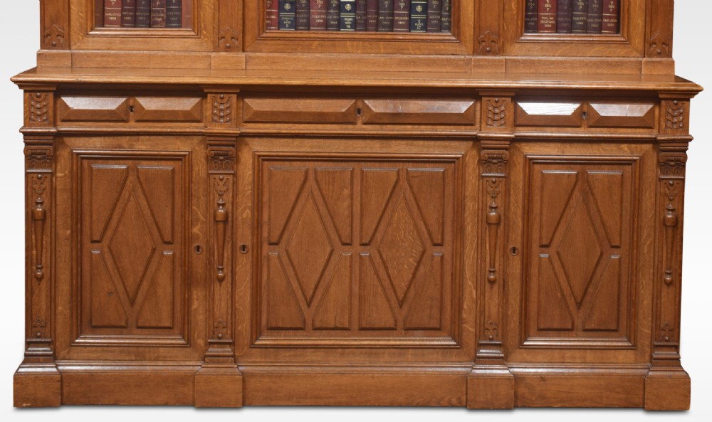 Substantial 19th century carved oak bookcase View IV