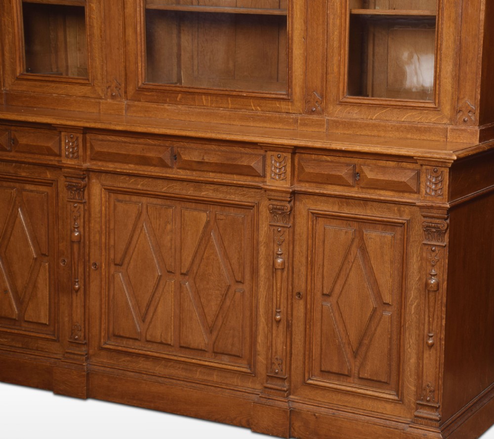 Substantial 19th century carved oak bookcase View V