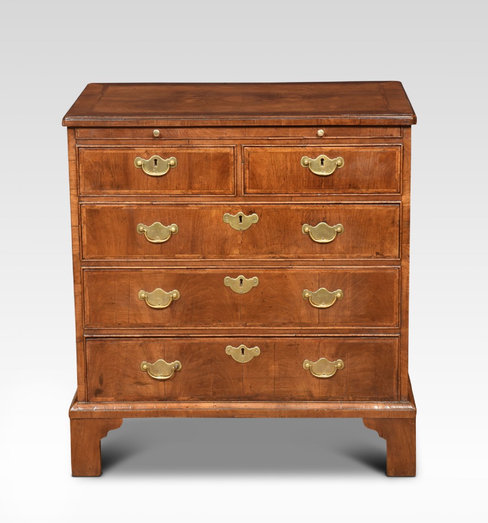 Pair of bachelor’s figured walnut and feather banded chests View II