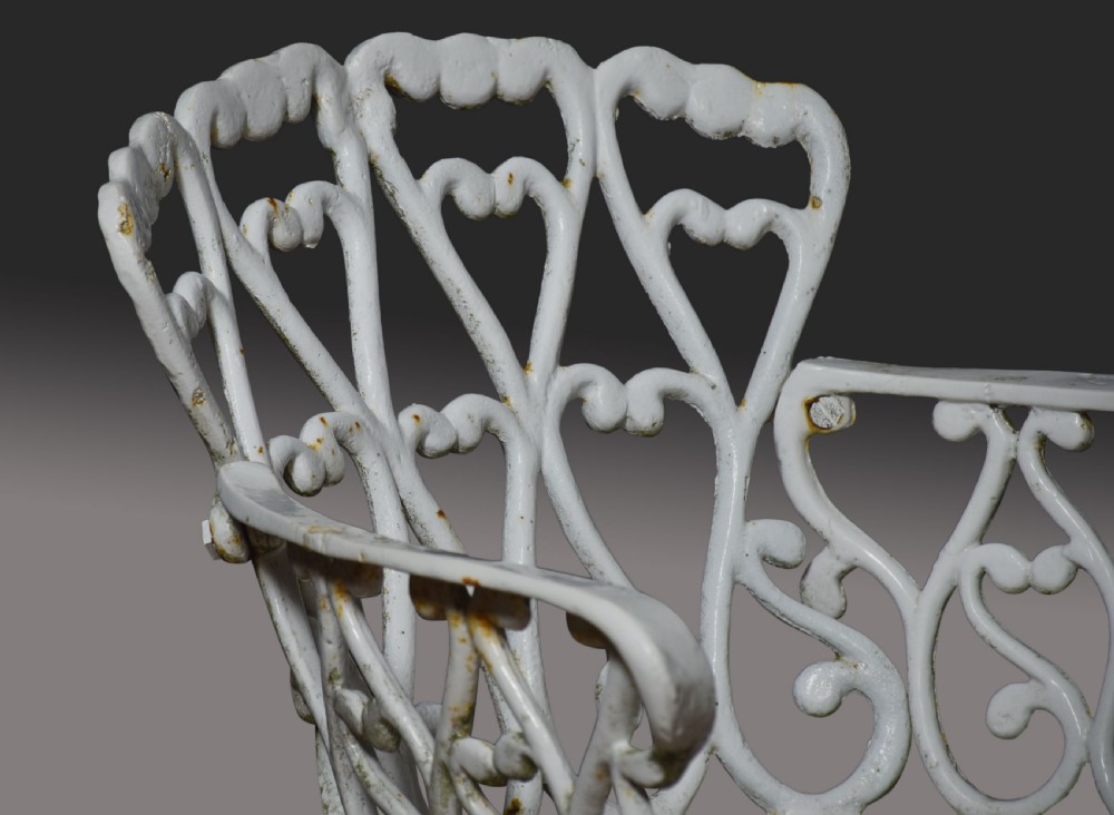 Set of five cast iron Coalbrookdale style garden chairs View V