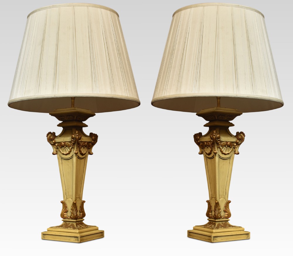 Pair of carved painted table lamps