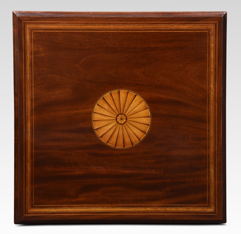 A pair of Edwardian inlaid mahogany revolving bookcases featuring square tops with satinwood crossbanding, vertical slat sides, and rotating bases on castors. View VII