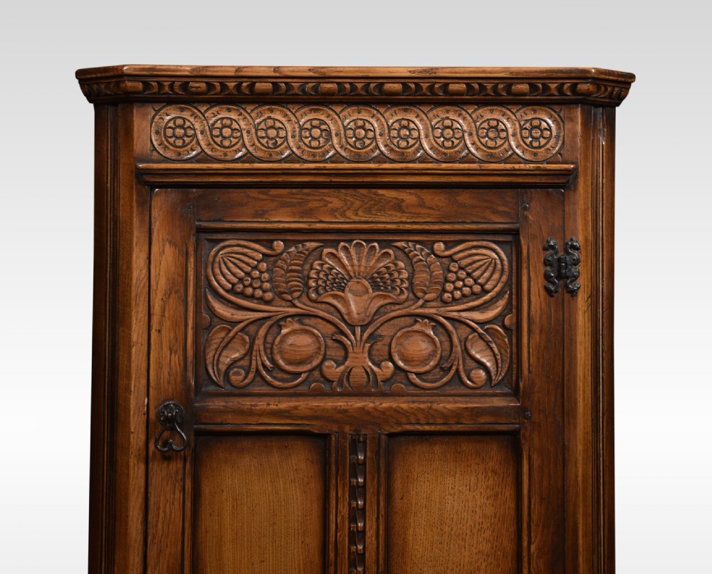 Carved Oak Corner Cupboard View II