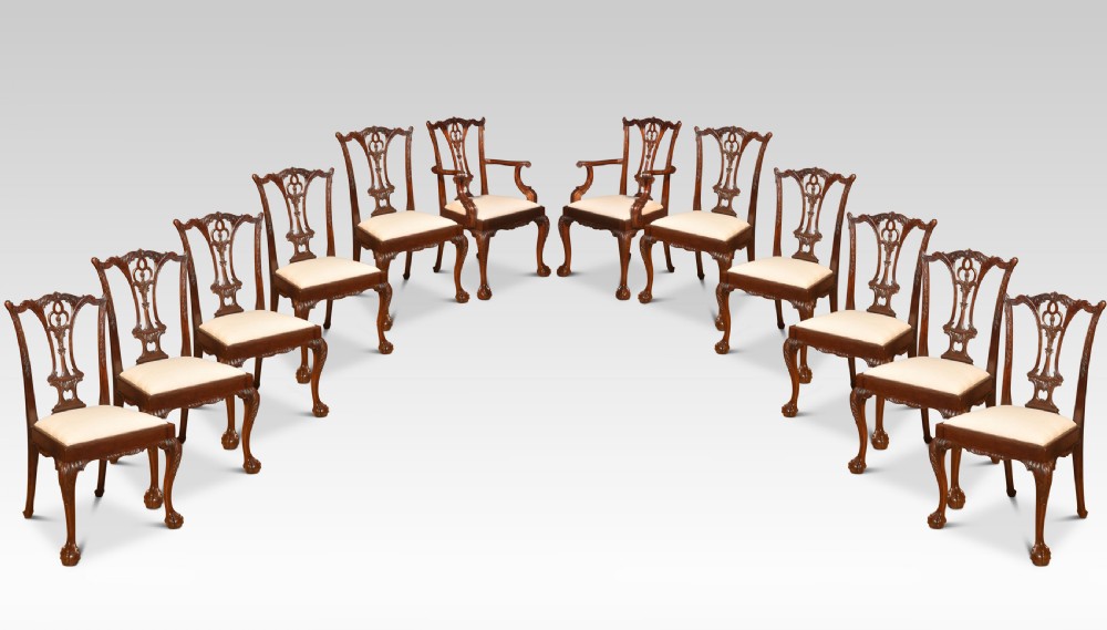 set of twelve mahogany dining chairs in Chippendale style