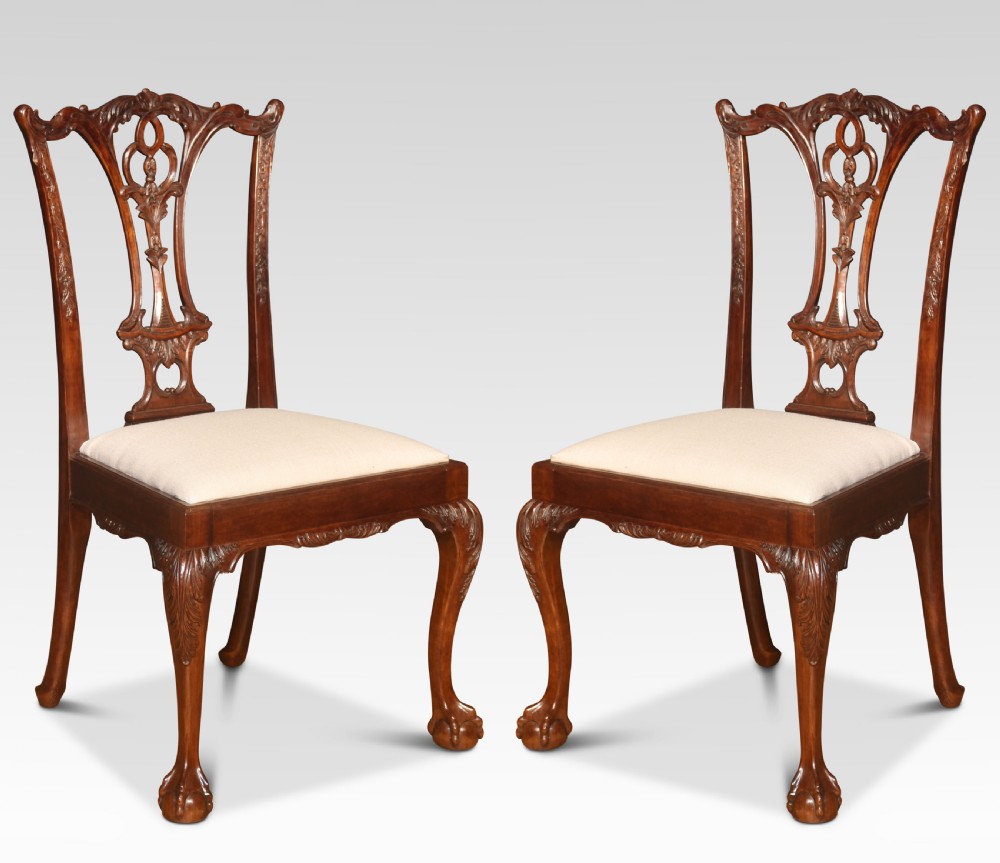 set of twelve mahogany dining chairs in Chippendale style View VIII