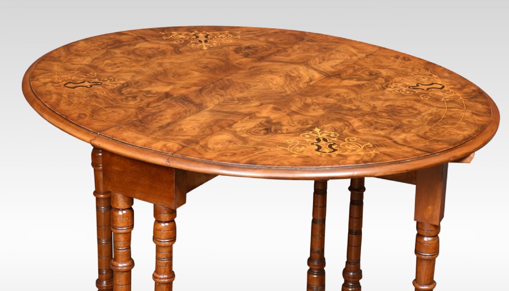 Victorian burr walnut Sutherland table with floral marquetry inlay, turned spindle legs, and drop-down leaves. View III