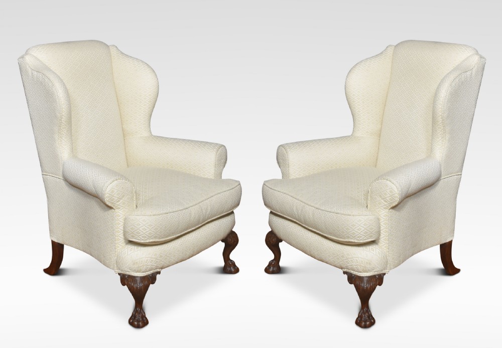 Pair of Georgian style wingback armchairs
