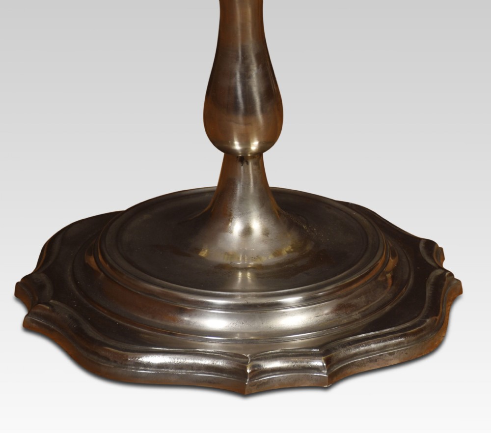 A tall silvered metal standard lamp featuring a multi-arm candelabra fitment on a turned column and shaped circular base. View III