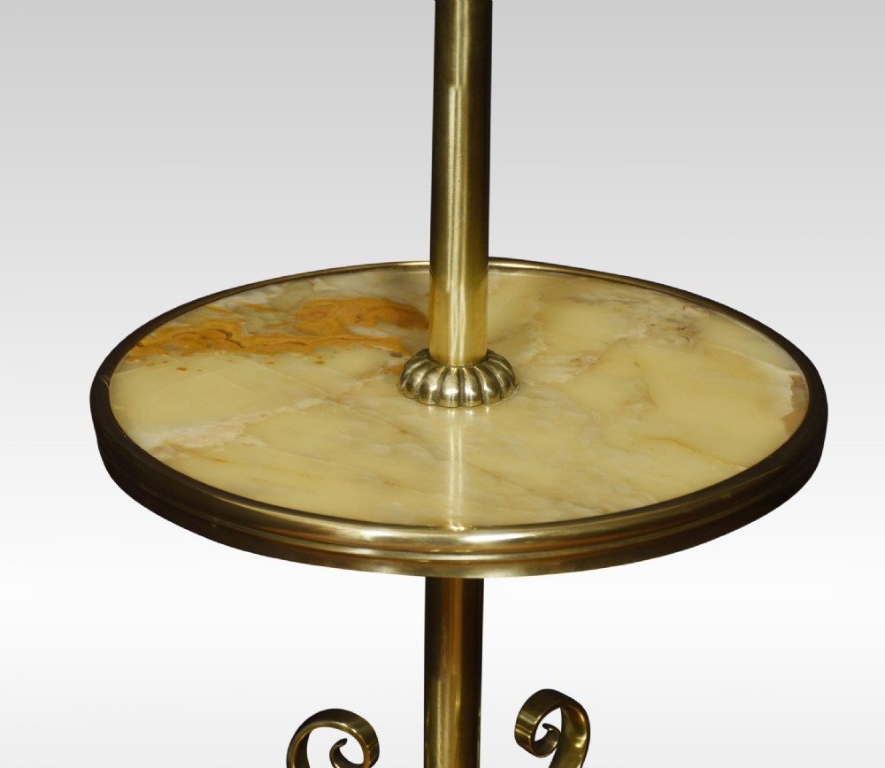 An antique brass standard lamp featuring a central circular onyx tray table, scrolled support brackets, and ornate cast feet. View III