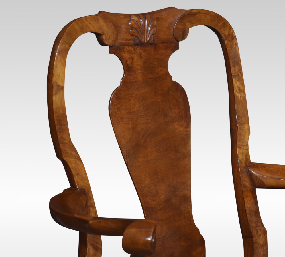 Set of ten walnut George II style dining chairs View III