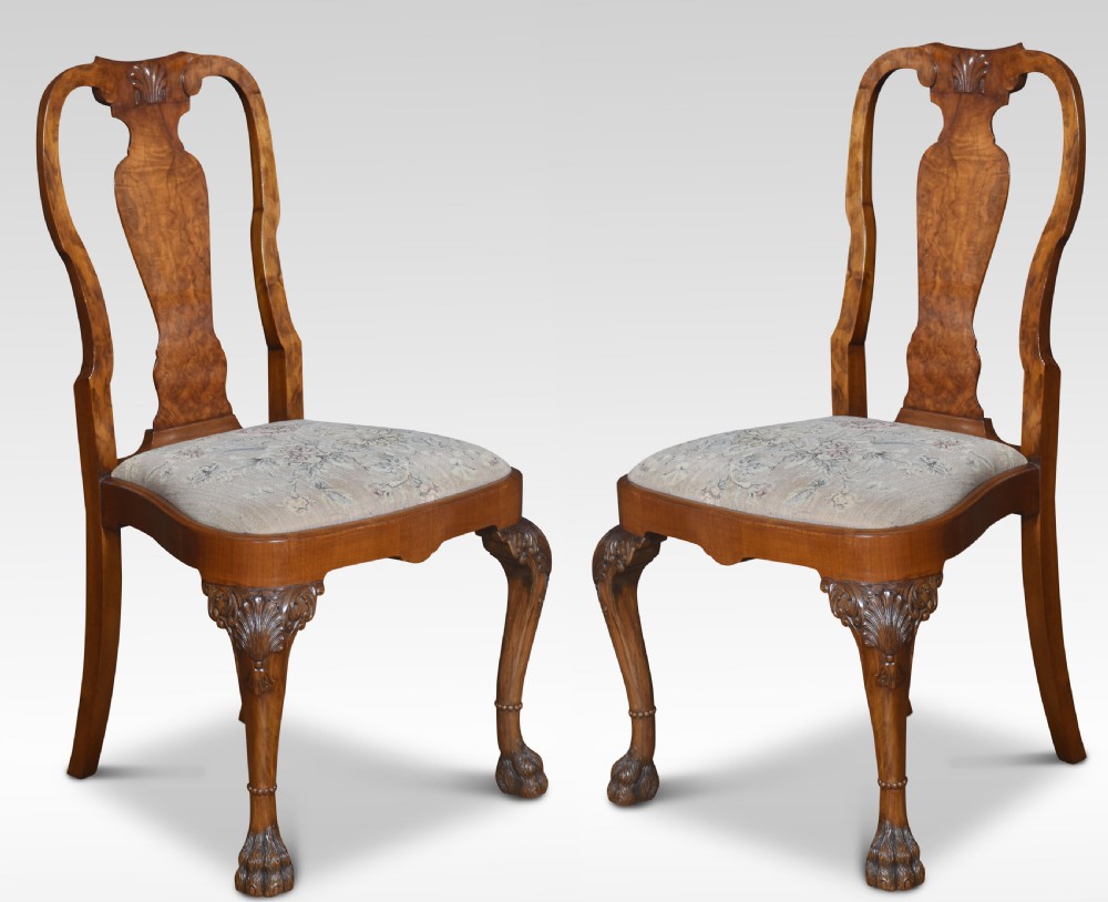 Set of ten walnut George II style dining chairs View VII