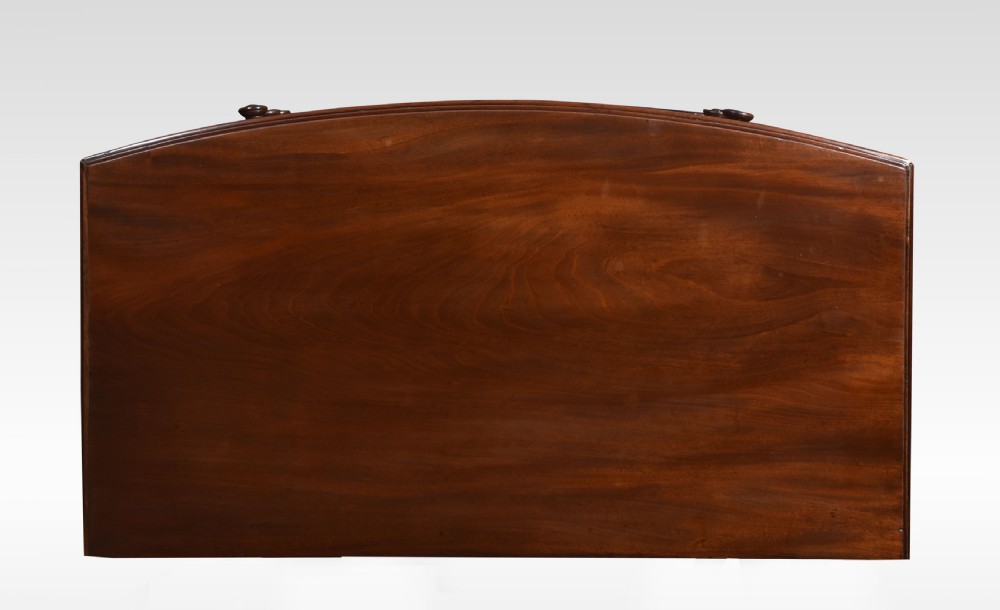 An antique Regency flame mahogany chest featuring four curved bow-front drawers with turned wooden knobs and splayed bracket feet. View VIII