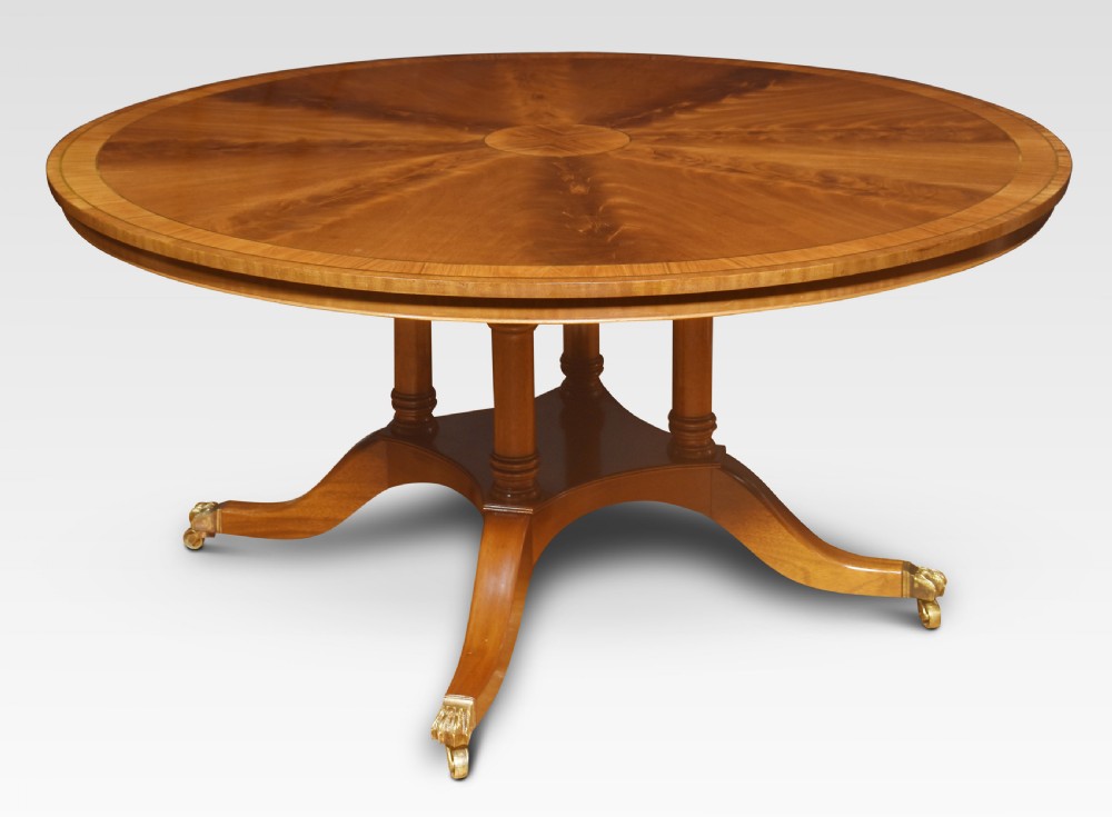 Mahogany brass inlaid circular dining table