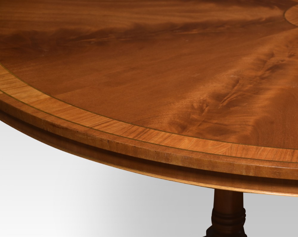 Mahogany brass inlaid circular dining table View IV