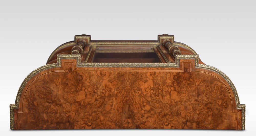 A nineteenth-century figured walnut credenza with a glazed central door, open mirrored side shelves, floral marquetry inlay, and gilt-bronze mounts. View XIV