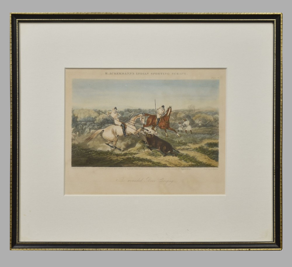 A set of four hand-coloured antique engravings depicting mounted riders engaging in boar hunting scenes in an Indian landscape. View V