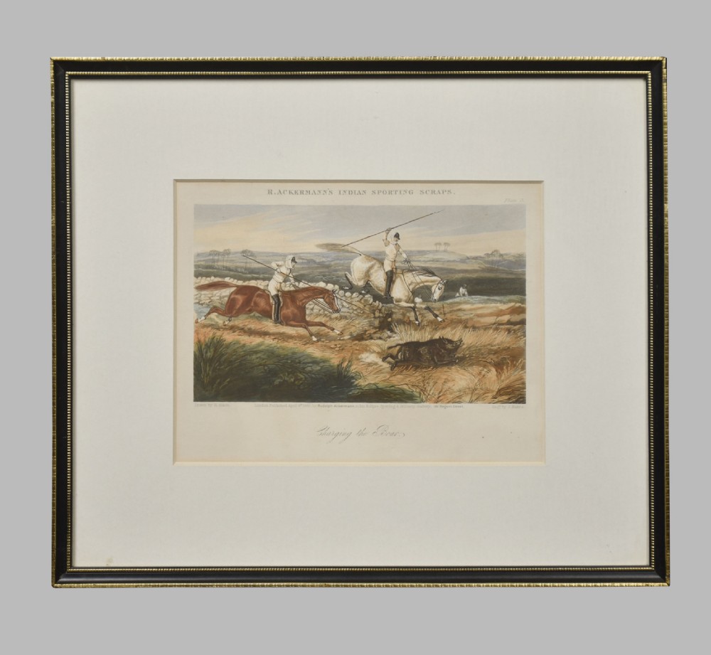 A set of four hand-coloured antique engravings depicting mounted riders engaging in boar hunting scenes in an Indian landscape. View VII