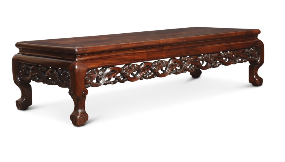 A pair of rectangular low Chinese hardwood coffee tables featuring detailed openwork carved aprons and short cabriole legs. View III