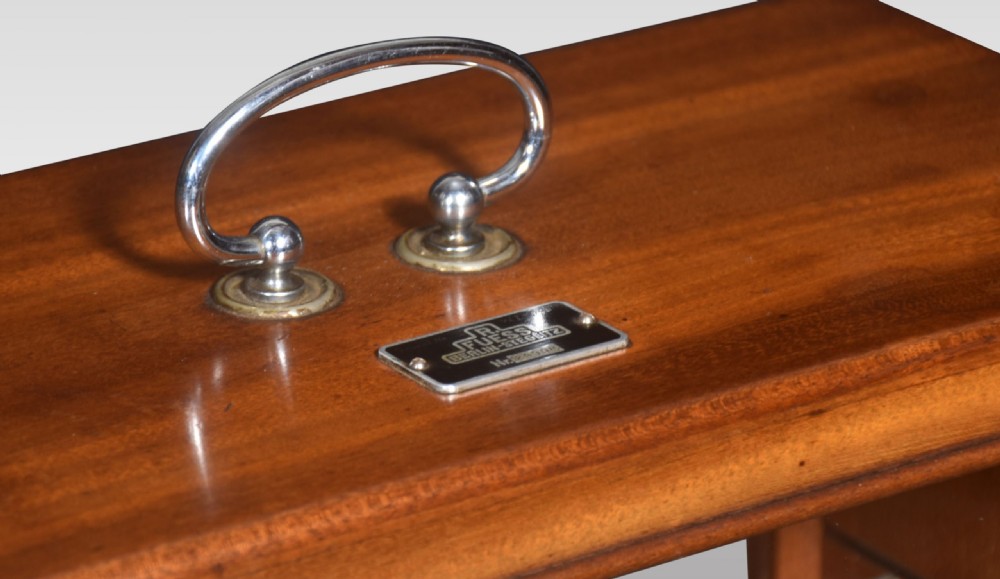 An antique mahogany barograph with glass panels displaying an internal brass mechanism, aneroid capsules, and a paper chart drum. View V