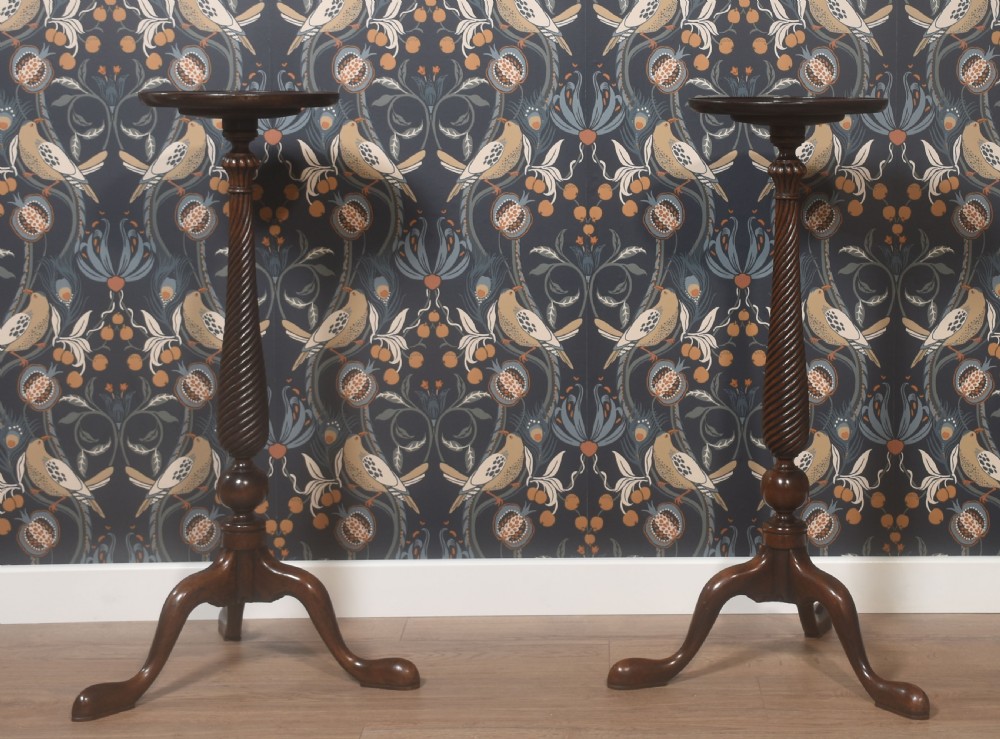 Pair of tall mahogany lamp tables