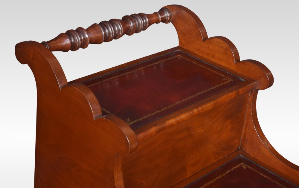 A 19th-century mahogany library step stool featuring three treads inlaid with gold-tooled leather and a top turned wooden handle. View VII