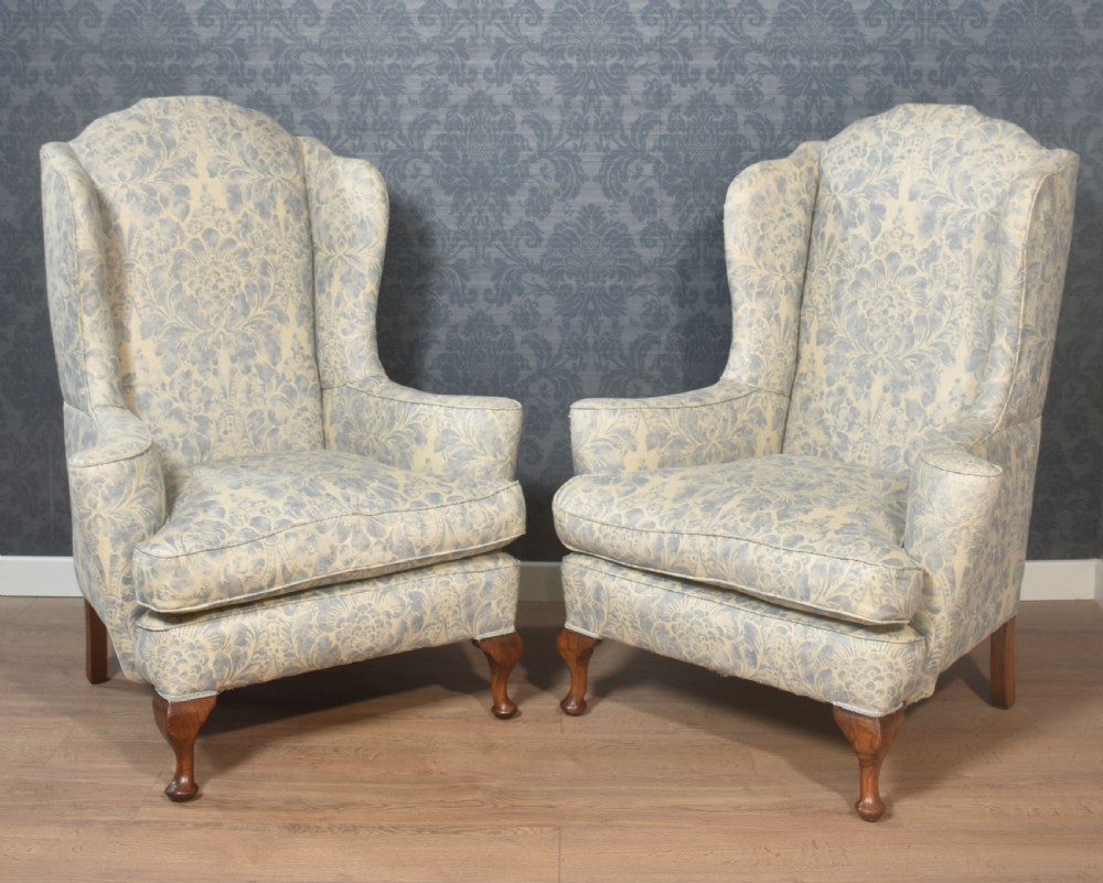 Pair of Georgian style wingback armchairs