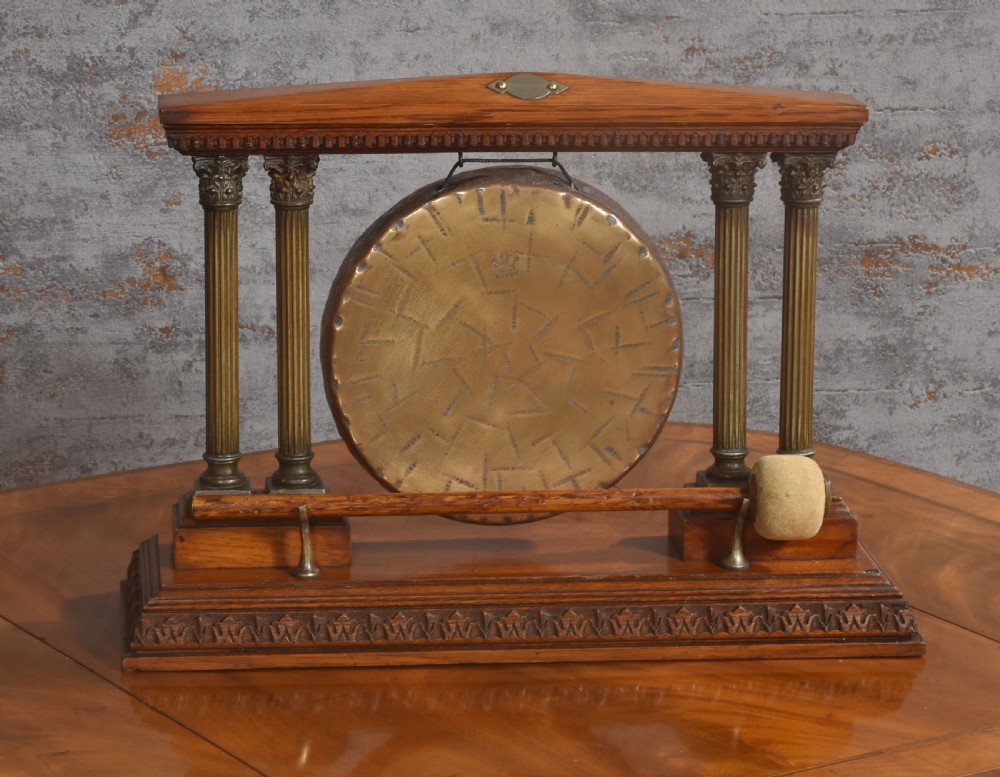 Oak and brass table gong